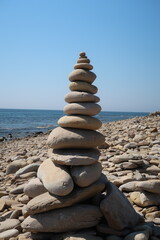 cairn, stone balance, pyramid of stones on the beach