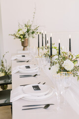 Chic wedding table with floral elegance and candlelight