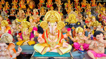 Beautiful Ganesha murtis idols during Ganeshotsav display in shop and market