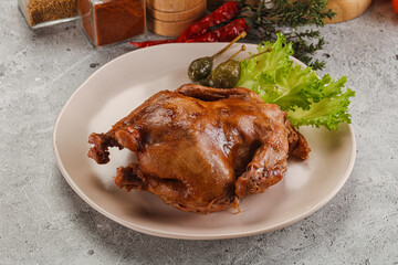 Baked small chicken with spices