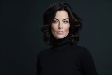 Naklejka premium Confident middleaged woman in black turtleneck sweater.