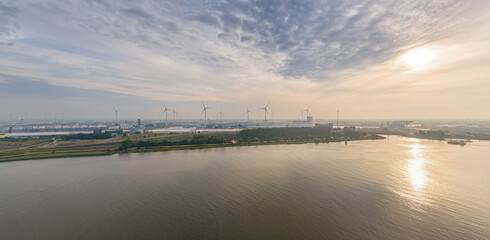 Fototapeta na wymiar Antwerp, Belgium. Panorama of the city. River Scheldt (Escout). Summer morning. Industrial area. Aerial view