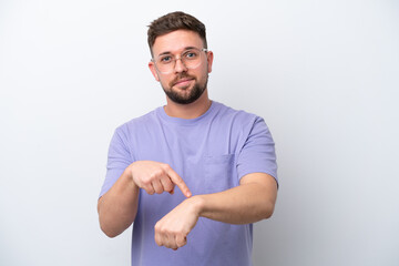 Young caucasian man isolated on white background making the gesture of being late - obrazy, fototapety, plakaty