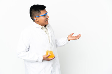 Young Ecuadorian scientific man with surprise expression while looking side