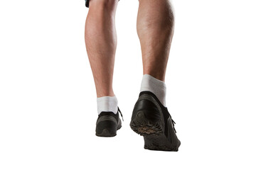 Lower legs and feet of a person wearing black shoes and white socks, isolated on a white background, illustrating a fitness or sports concept