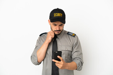 Young security  caucasian man isolated on white background thinking and sending a message