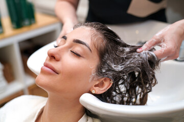 A relaxing shampoo prepares a client for a stem cell hair treatment.