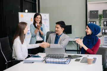 Fototapeta na wymiar Business partnership handshake concept.Photo two coworkers handshaking process..