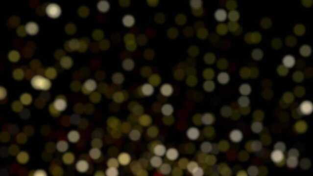 Golden, yellow, and white, fast moving particles flicker and dance around in this looping particle simulation. High resolution background animation element, out of focus bokeh motion graphic