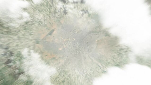 Earth zoom in from space to Maiduguri, Nigeria. Followed by zoom out through clouds and atmosphere into space. Satellite view. Travel intro. Images from NASA