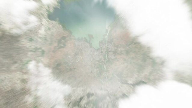 Earth zoom in from space to Bahir Dar, Ethiopia. Followed by zoom out through clouds and atmosphere into space. Satellite view. Travel intro. Images from NASA