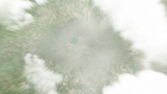 Earth zoom in from space to Bambari, Central African Republic. Followed by zoom out through clouds and atmosphere into space. Satellite view. Travel intro. Images from NASA