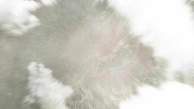 Earth zoom in from space to Baidoa, Somalia. Followed by zoom out through clouds and atmosphere into space. Satellite view. Travel intro. Images from NASA