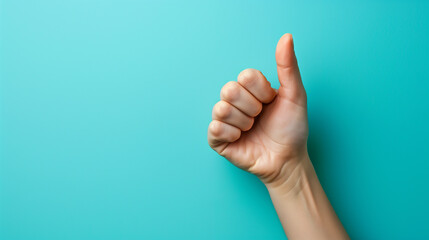 Hand pointing up on blue background, gesturing, success, human arm, fist - obrazy, fototapety, plakaty