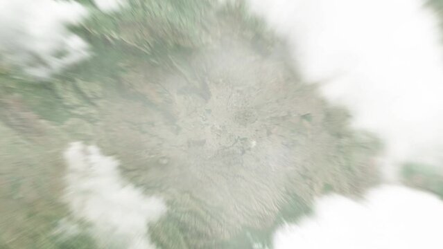 Earth zoom in from space to Mbeya, Tanzania. Followed by zoom out through clouds and atmosphere into space. Satellite view. Travel intro. Images from NASA