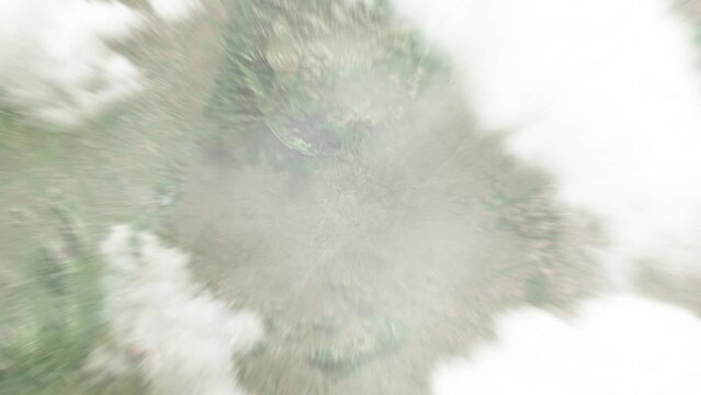 Earth zoom in from space to Zomba, Malawi. Followed by zoom out through clouds and atmosphere into space. Satellite view. Travel intro. Images from NASA