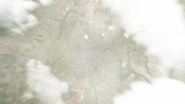 Earth zoom in from space to Mansa, Zambia. Followed by zoom out through clouds and atmosphere into space. Satellite view. Travel intro. Images from NASA