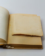 Open old book with blank pages and free space for text. The concept of reading literature, education and book publishing