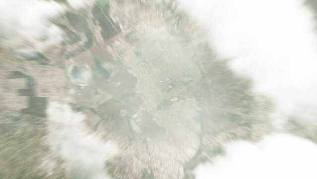Earth zoom in from space to Kitwe, Zambia. Followed by zoom out through clouds and atmosphere into space. Satellite view. Travel intro. Images from NASA