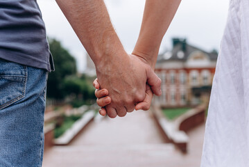couple holding hands