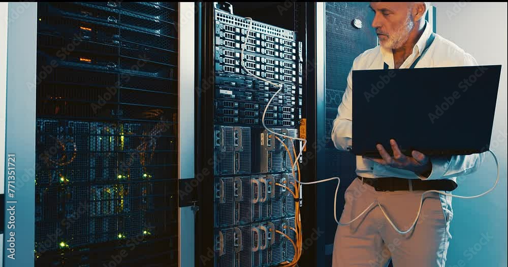 Poster Mature man in server room with laptop, inspection on network and engineer in digital storage for database update. Tech service, system administration and technician online in data center on computer