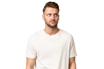 Young blonde caucasian man over isolated background making doubts gesture looking side