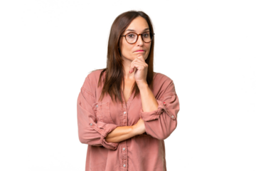 Middle-aged caucasian woman over isolated background having doubts and thinking
