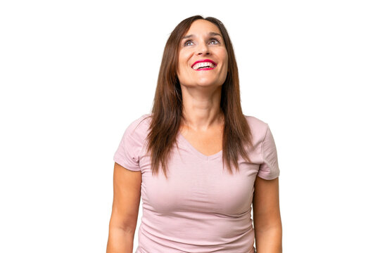 Middle-aged caucasian woman over isolated background laughing