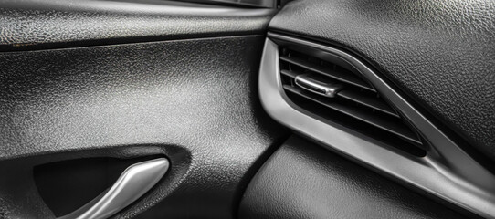 close up of car door, Car console, Air vent in the car, Black artificial leather material, car...