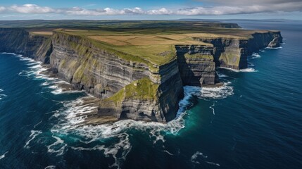 Cliffs of Moher located on Atlantic coast of County Clare, Ireland. They rise 702 feet above Atlantic Ocean at Hag's Head, have been described as 