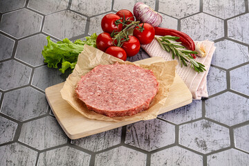 Raw beef uncooked burger cutlet