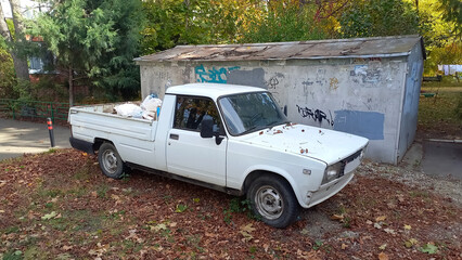 Old car near the garage. Russian car. LADA.