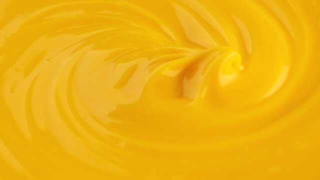 Cheese sauce. Chef stirring cheese sauce with whisk