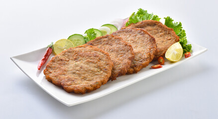 Chicken Chapli kebab or chapli kabab is a Pashtun-style minced kebab, usually made from ground beef, mutton or chicken with various spices in the shape of a patty. 