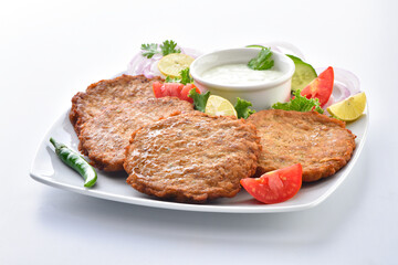 Chicken Chapli kebab or chapli kabab is a Pashtun-style minced kebab, usually made from ground beef, mutton or chicken with various spices in the shape of a patty. 