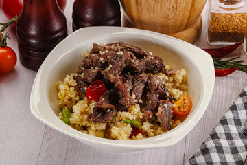 Traditional couscous with beef and vegetables