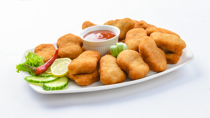 Chicken Nuggets. A chicken nugget is a food product consisting of a small piece of deboned chicken meat that is breaded or battered, then deep-fried or baked.