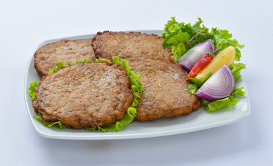 Chicken Chapli kebab or chapli kabab is a Pashtun-style minced kebab, usually made from ground beef, mutton or chicken with various spices in the shape of a patty. 