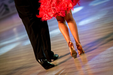 a couple dance a Latin dance. the legs of a dancing couple