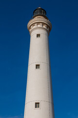 the white lighthouse tower of San Vito lo Capo.
