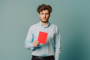 Jewish man with red card symbolizing stand against anti-Semitism