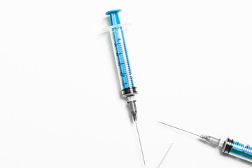 Disposable plastic syringe prepared for injection and vaccination in the hospital