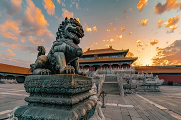 Foto auf Acrylglas In the ancient Chinese Forbidden City, there is an oversized bronze lion and copper ball on both sides of its feet. © Kien