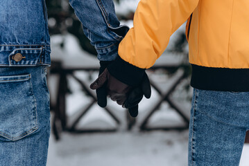 couple holding each other hands
