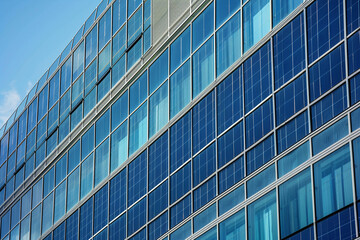 Photovoltaic panels on a corporate building, symbolizing the integration of green energy and solar innovation in business environments.