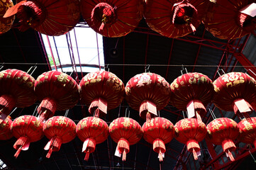 BANGKOK, THAILAND - March 30, 2024: Chinese Paper Lanterns hanging on a rope New Year Festival at...