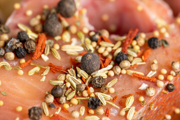 raw fish with red meat during cooking