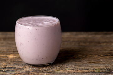 pink fermented milk drink with berry flavor