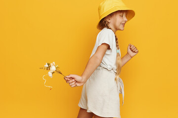 Young Woman in Summer Outfit with Windmill Toy