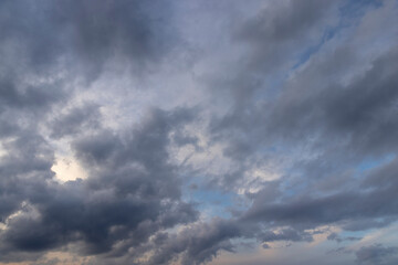 beautiful sky with slowly moving clouds in the sky at dusk